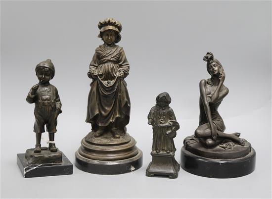 Three bronze figures of a boy and two girls and a spelter figure tallest 27cm